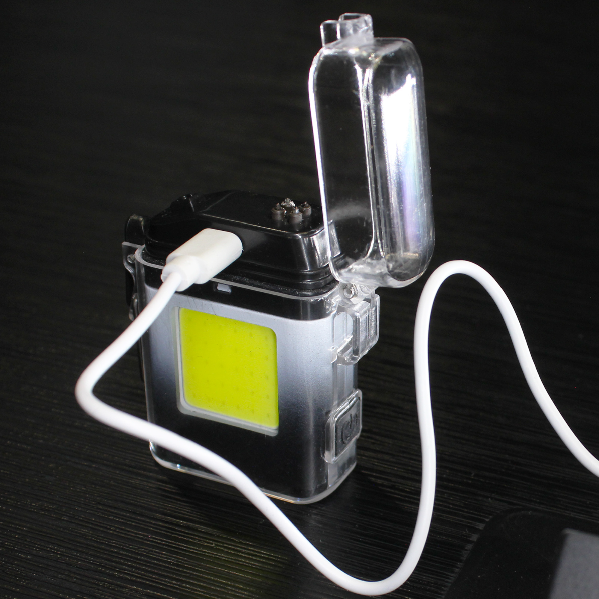 Encendedor con Linterna.